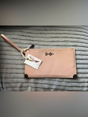 Jessica Simpson Blush Pink Wristlet Clutch with Gold Feather Charm